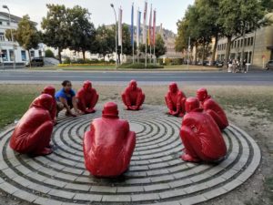 Blending in with Red Monks in a circle